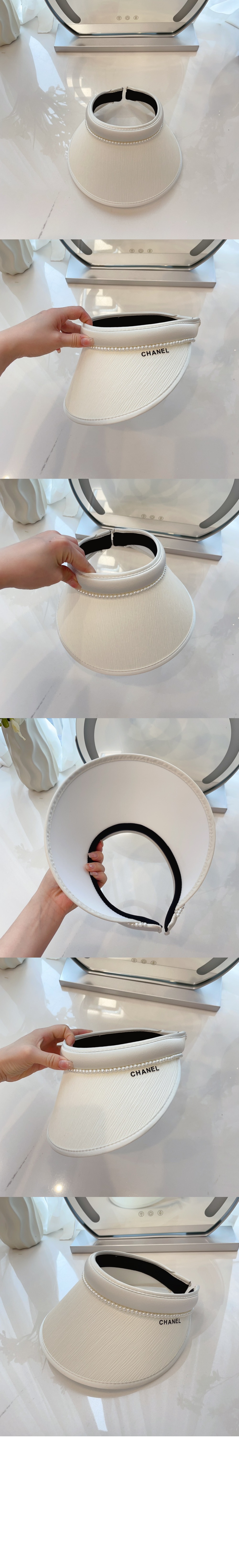 선캡 AA9854 > 샤넬