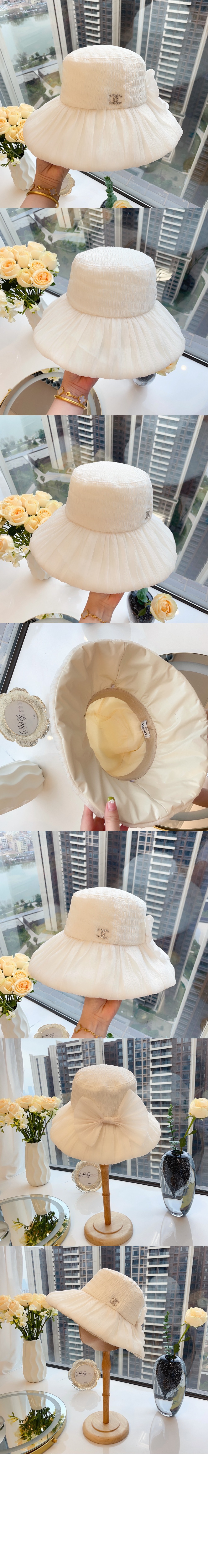 선캡 AA9257 > 샤넬