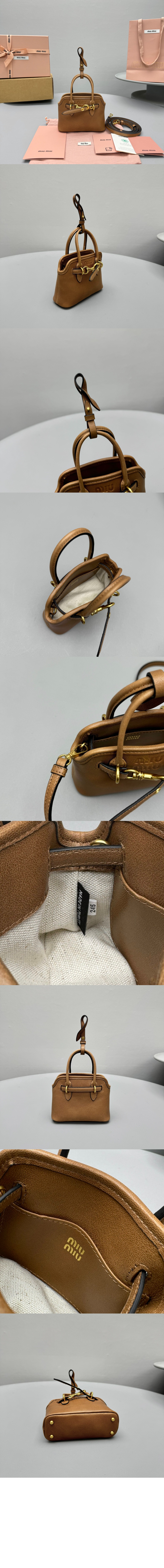 가죽 트릭 블랙 5NR037 > 미우미우